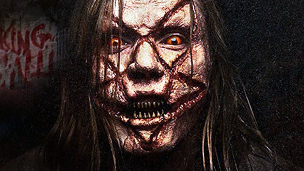 upiorna twarz z wyciętym na niej pentagramem